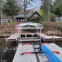 Boat lift installed at a lakeside property